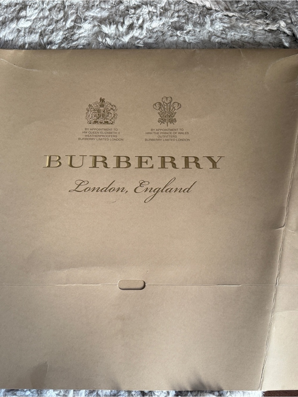 Assorted bags from Maje, Burberry, VCA, Cartier and Swarovski